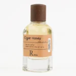 RABDAN Cigar Honey 50ML EDP is a luxurious fragrance for men, blending sweet honey and cloves with a heart of tobacco and vanilla, resting on a warm base of oud and sandalwood. This luxury perfume is a top choice among UAE perfumes for its bold and elegant profile.
