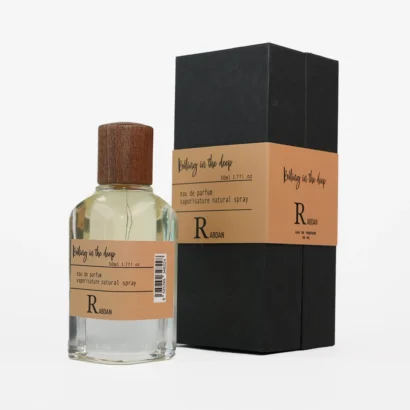 RABDAN Rolling in the Deep 50ML EDP is a luxurious fragrance for men and women, blending pear and hazelnut with a floral heart of osmanthus, rose, and jasmine sambac, resting on a base of sandalwood, ambergris, and vanilla. A standout luxury perfume among UAE perfumes.